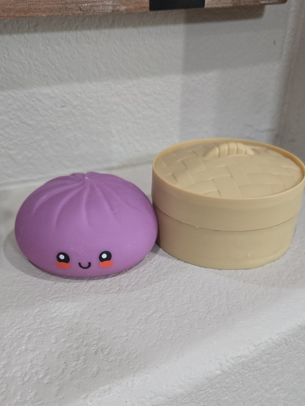 Crazy Fun Purple Dumpling Kids Squishi Toy.